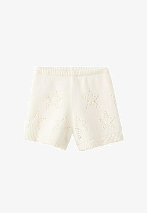 Kremasto bijele pletene kratke hlače s uzorkom oka u obliku zvijezda te rebrastim pojasom i rubovima nogavica.