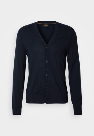 Marineblaue Wollstrickjacke mit V-Ausschnitt, fünf Knöpfen, gerippten Bündchen und Saum, dezentem Logo auf der Brust, weichem Textur und normaler Passform.