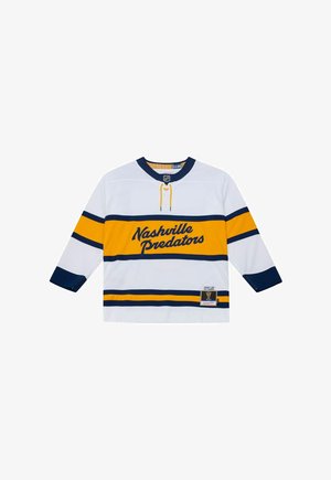 Maglia da hockey bianca dei Nashville Predators con strisce gialle e blu navy, colletto blu navy e testo "Nashville Predators" sul petto.