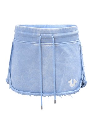 Mini-jupe en denim bleu clair avec bords effilochés, taille côtelée, cordons à l'avant et petit logo blanc brodé sur le côté droit avant.