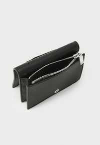 Black leather wallet with a textured finish, featuring a silver zipper and a silver accent on the front. Opened for visibility of inner compartments.