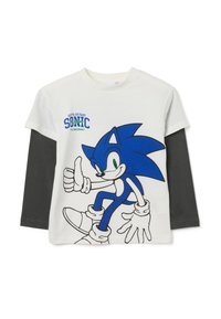 Camisa de manga larga en blanco y negro con capas que presenta a Sonic el Erizo haciendo un gesto de pulgar hacia arriba y el texto "Tengo que ir rápido Sonic".