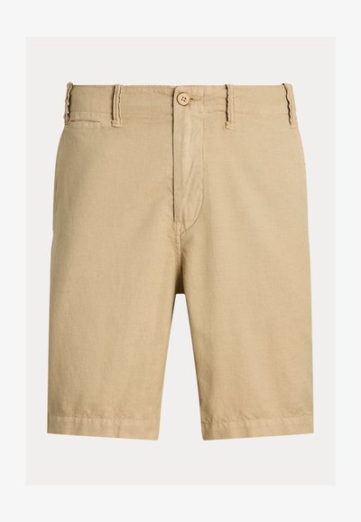 Beige shorts laget av lett stoff, med glatt front, knappelukking og en litt teksturert overflate, med oppbrettede kanter.