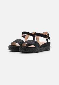 Unisa Sandali con plateau - black