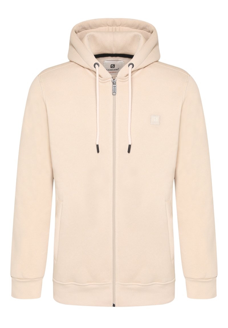 Felpa zip beige chiaro. Realizzata in tessuto morbido, con cappuccio regolabile, tasche a marsupio, polsini a costine e un piccolo logo sul petto.