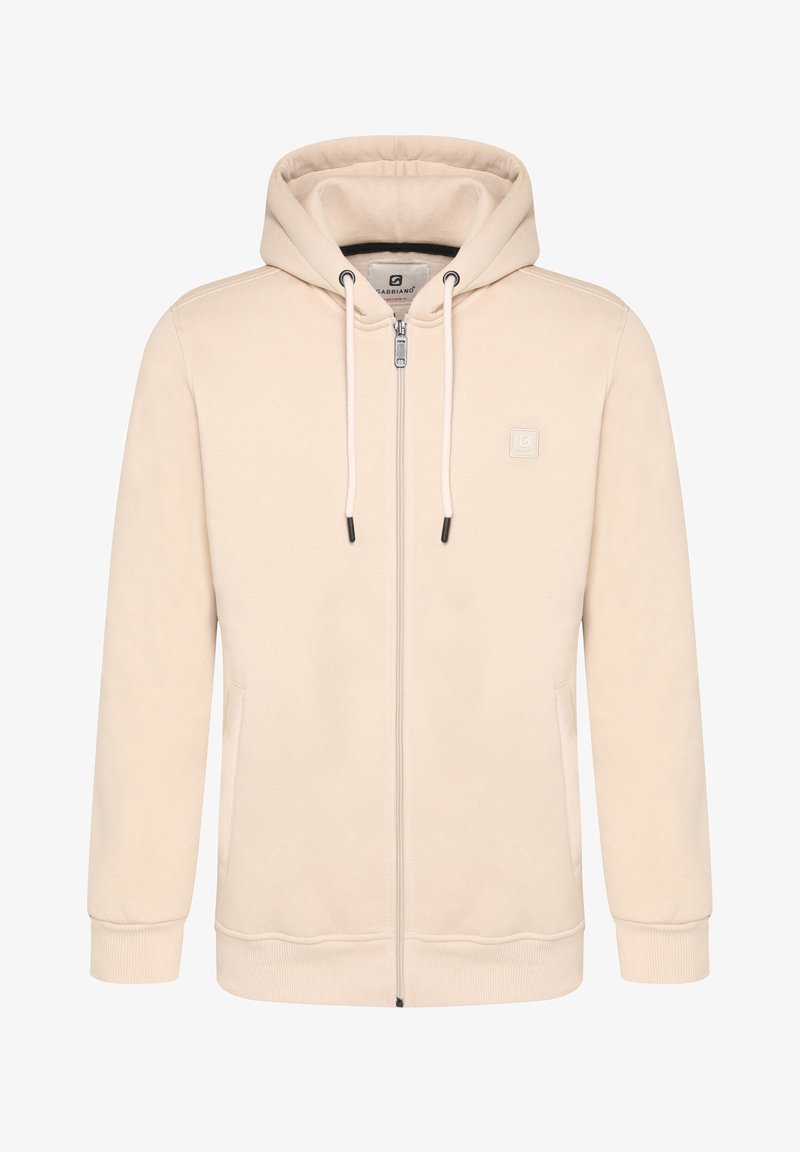 Lichtbeige zip-up hoodie. Gemaakt van zachte stof, met een trekkoordkap, kangaroo pockets, geribde manchetten en een klein logo op de borst.