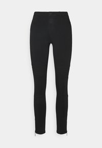Jeans ajustados negros de mezclilla elástica, con acentos acanalados en las rodillas y pequeños dobladillos con cremallera en los tobillos.