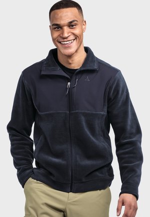 Navy zip-up fleece jacket with a smooth texture, contrasting panel design, stand-up collar, and front pockets. Features logo detail on chest.