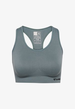 Sportbh in gedempt teal, gemaakt van een mengsel van gerecycled polyester en elastaan. Heeft een racerback ontwerp en een textuurdetail.