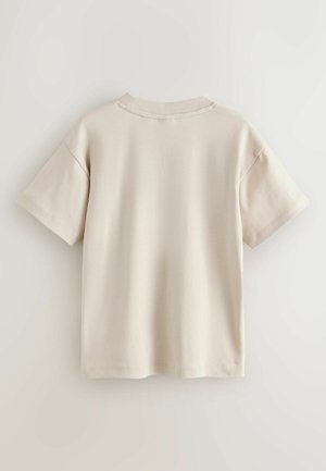Beige bomulds T-shirt med korte ærmer, enkelt crew neck design og en glat tekstur. Ingen synlige mønstre eller hardware.
