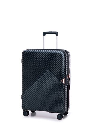 Black hard-shell suitcase with diagonal ribbed texture, silver handle, and four wheels. Features a triangular logo accent and zipper closure.