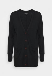 Mustat neuletakki, jossa on V-pääntie, kolme nappia edessä, kaksi sivutaskua, pitkät hihat sekä ribbireunukset hihansuissa ja helmassa. Valmistettu pehmeästä materiaalista.