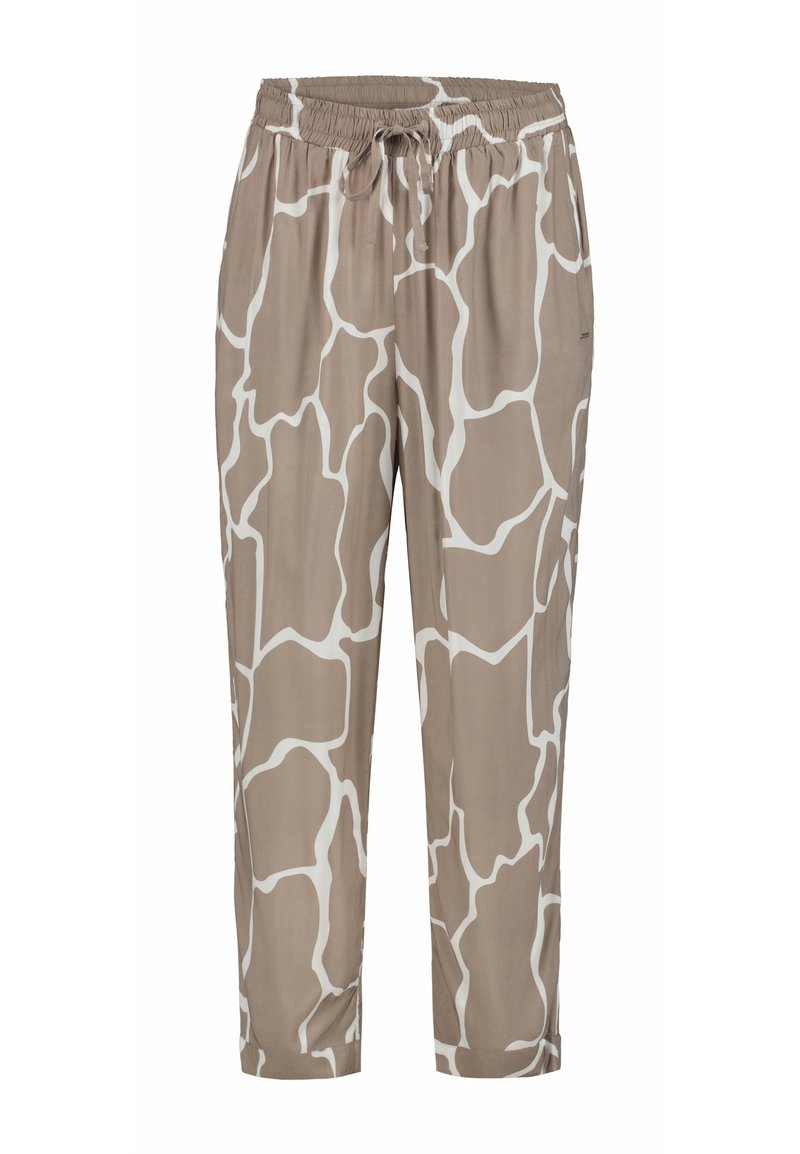 Lätta, beige byxor med ett vitt abstrakt mönster. Har en elastisk midja och dragsko, tapered ben-design, slät yta.
