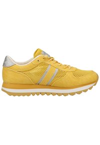 Yellow athletic shoe featuring mesh material, silver stripes, and a ridged sole for grip. The heel has a silver accent.