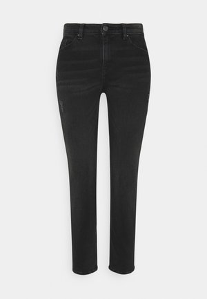 Jean en denim noir avec une coupe slim, comportant une fermeture à bouton, des poches avant et des détails légèrement usés au niveau des genoux.