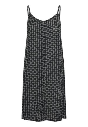 Schwarzes ärmelloses Kleid mit dünnen Trägern und einem durchgehenden Muster kleiner weißer kreisförmiger Blumen.