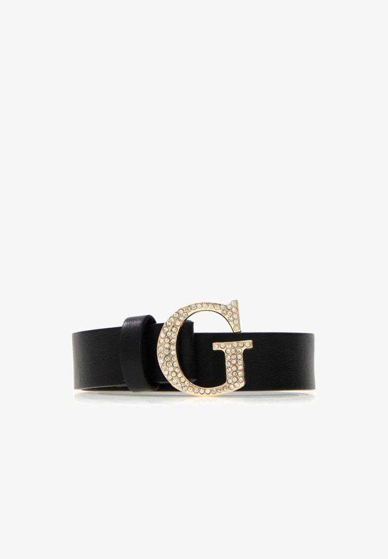 Černý kožený pásek se zlatou sponou ve tvaru "G" ozdobenou průhlednými kamínky, zobrazený stočený na bílém pozadí.