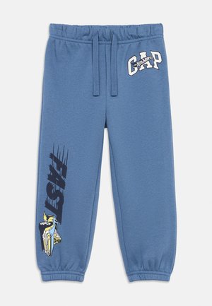 Blue sweatpants with an elastic waistband, featuring "GAP" logo and a graphic with the word "FAST" in black on the left leg.