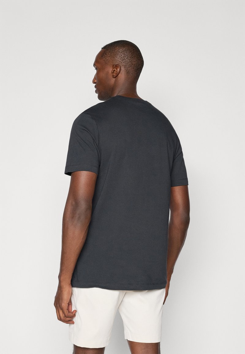 Nike Golf TEE GOLF - Triko s potiskem - off noir