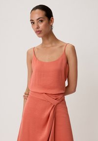 comma Top