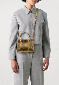 PARFOIS CROSSBODY BAG ROCKY S - Håndveske - gold-coloured