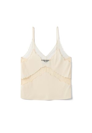 Cream-colored sleeveless camisole with thin straps and scalloped lace trim along the neckline and hem.