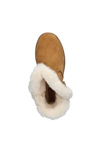 Bruine suède laars met een witte nepbont voering, met een afgeronde neus en een zachte, pluche textuur rond de enkel.