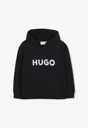 Sweat à capuche noir en tissu mélange de coton, avec une poche kangourou et un grand logo blanc "HUGO" sur le devant. Matière douce et texturée.
