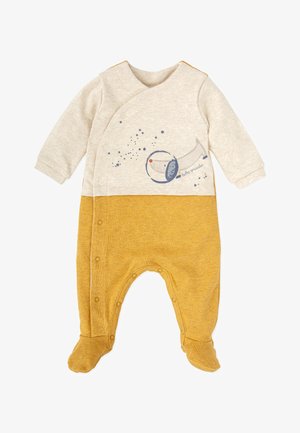 Une combinaison pour bébé couleur beige clair et jaune moutarde en tissu doux, avec un design graphique rond présentant des points et un motif de trompette. Fermetures à pression sur le devant.