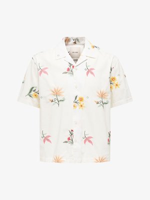 Chemise blanche à manches courtes, boutonnée, avec un col large et des motifs floraux multicolores en jaune, rose et vert.