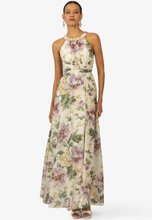 Floral maxi dress made of lightweight fabric, featuring purple and yellow flowers on a cream background, with a fitted bodice and flowing skirt.