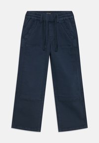Pantaloni a gamba larga blu navy con vita elastica, chiusura con cordoncino e due tasche frontali con dettagli a toppa.