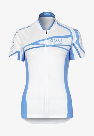 Kraťasy s krátkým rukávem na kolo v bílé barvě s modrými akcenty a vzory vln, vyrobené z prodyšné látky, vybavené celopropínacím zipem a stojáčkovým límcem.