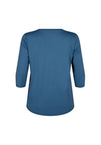 Dlhý rukáv top v jednotnej slate blue farbe. Vyrobený z hladkej tkaniny, má okrúhly výstrih a mierne zakrivený lem. Jednoduchý a minimalistický dizajn.