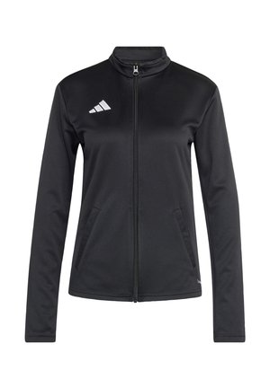 Černá sportovní bunda se zipem vpředu, vysokým límcem, dvěma bočními kapsami a bílým logem Adidas na levé straně hrudi. Hladká textura.