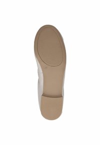 Sola della scarpa in gomma beige chiaro, texture con scanalature per una migliore aderenza. Tacco leggero con bordi puliti e un design minimalista. Marcatura della taglia presente.