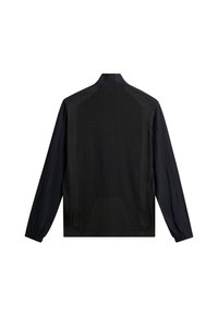 Giacca sportiva nera con maniche lunghe, caratterizzata da un retro in rete traspirante, tessuto texturizzato con finitura liscia e dettagli di branding discreti.