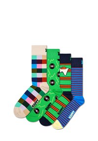 Cztery pary kolorowych skarpet: szachownica, winylowe płyty, jajka i wzory w paski; różne odcienie zieleni, niebieskiego, beżu i innych kolorów.