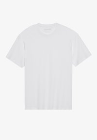 Bílý bavlněný T-shirt s kulatým výstřihem, krátkými rukávy a rovný střih. Bez vzorů nebo grafik; hladká textura s čistými švy.