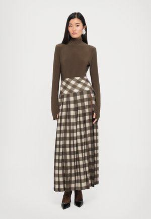 Rank 4: Norma Kamali - LONG SLEEVE TURTLE BODYSUIT - Long sleeved top