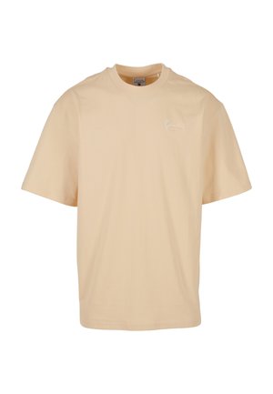 Beige kortærmet t-shirt med rund hals og lille hvid signaturlogo på venstre bryst.