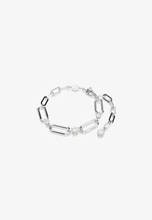 Silver bracelet featuring elongated links and round, clear crystal accents interspersed throughout the design. Smooth texture and minimalistic style.