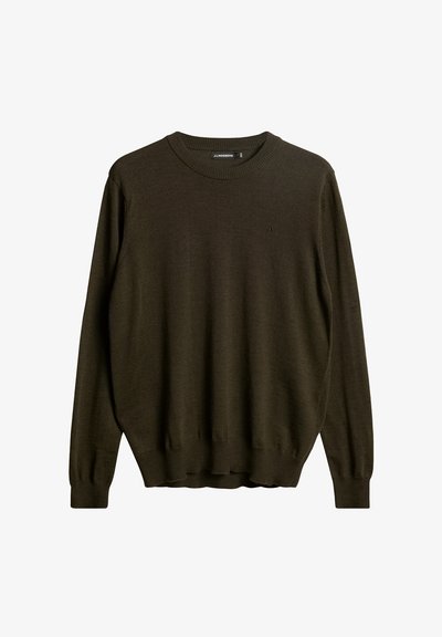Olivgrön tröja i mjukt stickat material. Har rundad hals, långa ärmar, ribbade manschetter och en liten logotyp på bröstet.