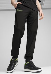 Puma MERCEDES-AMG PETRONAS F1 CLOUDSPUN - Tréningruha alsók - black