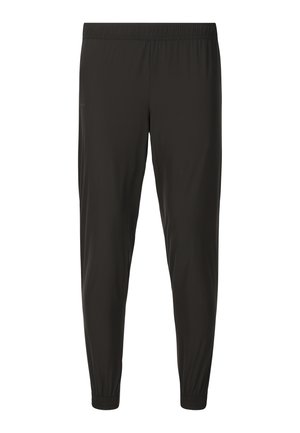 Sorte atletikbukser med smal pasform, elastisk taljebånd og ankelmanschetter, designet til hverdag eller sport.