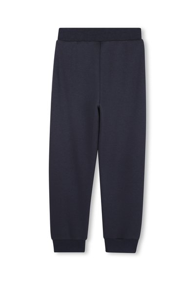 Marineblauwe sweatpants van zachte stof, met een elastische tailleband en boorden bij de enkels voor een taps toelopende pasvorm.