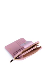 Pink leather wallet with a zipper, featuring card slots, a snap closure, and a textured surface. Gold hardware accents enhance the design.