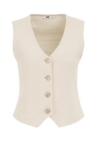 Beige ärmlös väst med V-ringning, texturerat tyg och fyra dekorativa knappar framtill. Fitted design med en lätt utvidgning i fållen.