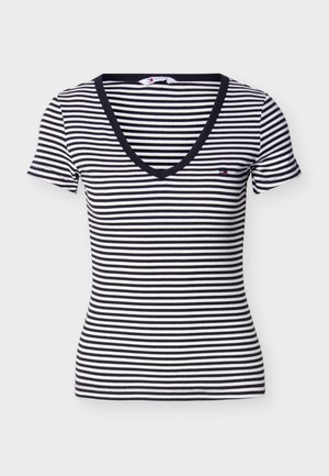 Μπλούζα με κοντά μανίκια σε οριζόντιες ρίγες ασπρόμαυρες, με V-λαιμόκοψη και μικρό λογότυπο στο αριστερό στήθος.