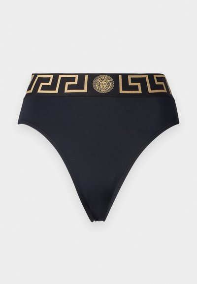Svart bikini-bunn med et gullfarget gresk nøkkelmønster og et Medusa-emblem på linningen, laget av glatt elastisk stoff.